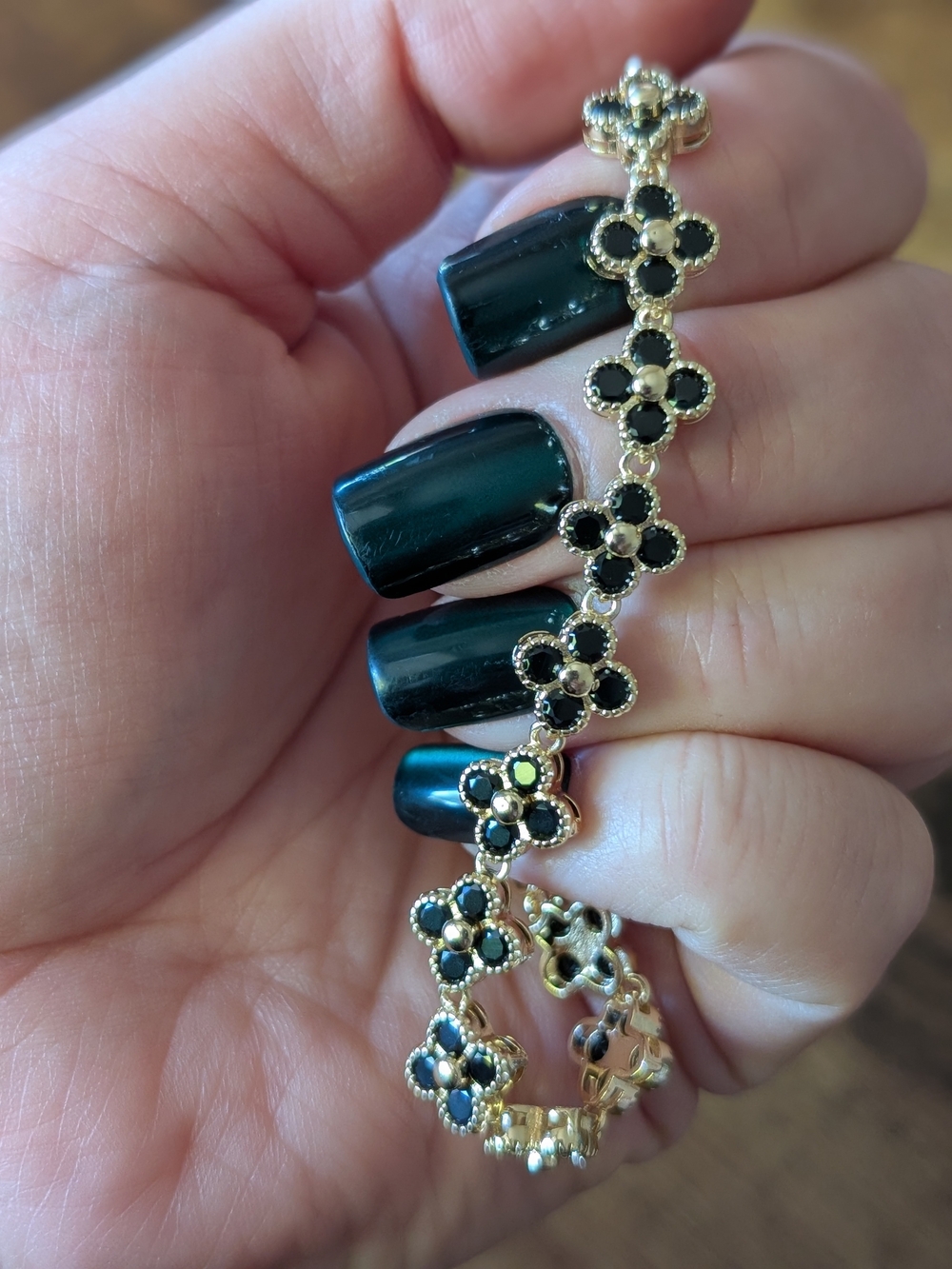 Gold Floral-Link Bracelet with Black Stones